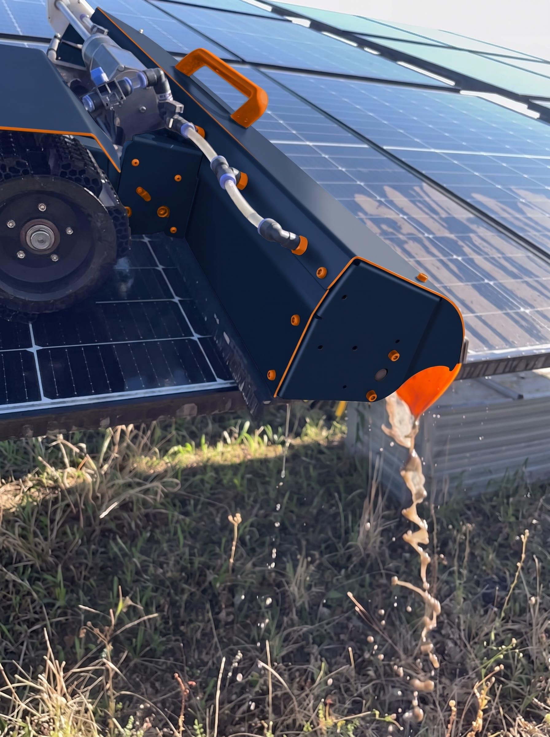 Robot de nettoyage Ellipsys avec sa brosse rotative sur des panneaux photovoltaïques